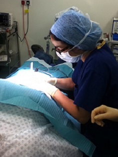 Dr Bordet performing an operation
